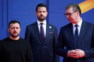 Ukrainian president Volodymyr Zelensky, Serbian president Aleksandar Vucic and president of Montenegro Jakov Milatovic stand on the day of the Ukraine Southeast Europe Summit in Tirana, Albania in February